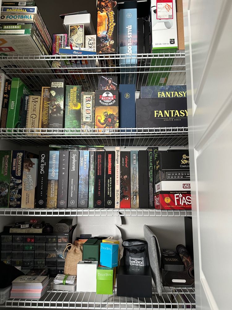 Bookshelf of ttrpg books and games