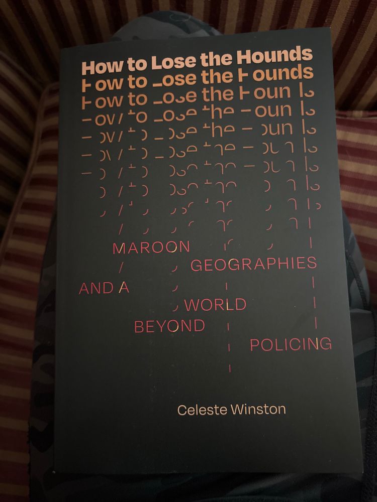 Book cover How to Lose the Hounds by Celeste Winston, the title repeats multiply down the front, reddish letters on black background, fragments of the letters in the title progressively disappearing through the iterations until the subtitle is revealed, “Maroon Geographies and a World Beyond Policing”