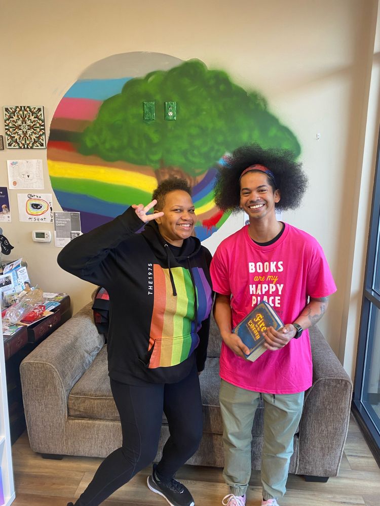 Meeting Mychal Threets, librarian, and gifting a copy of Fire In The Library board game.