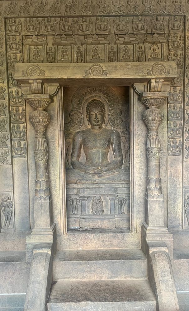 Looking a recreation of ancient cave with various carvings (I can’t identify any of them because I’m uneducated)