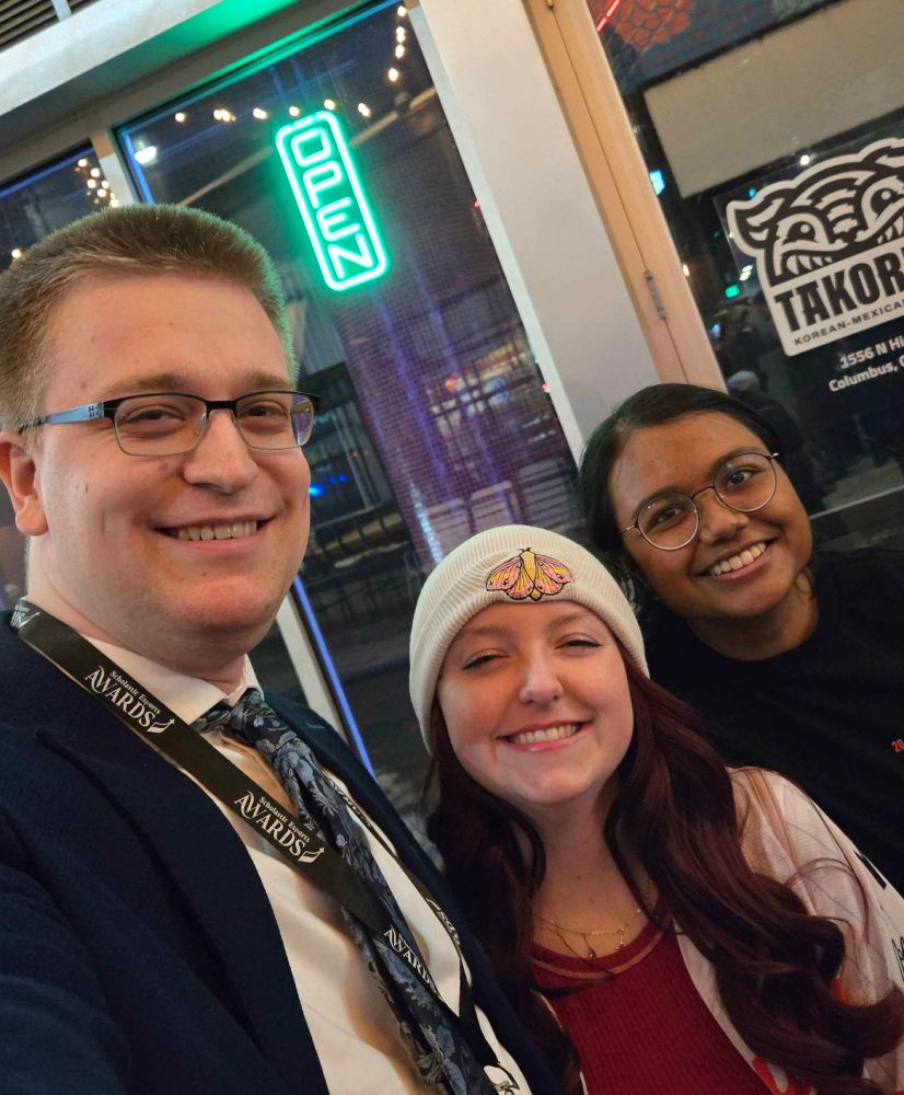 Kenneth, Sheridan, and ME smiling at the camera outside of Game Arena