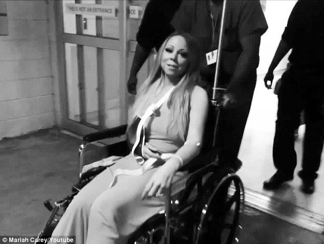 Mariah Carey in a wheelchair 