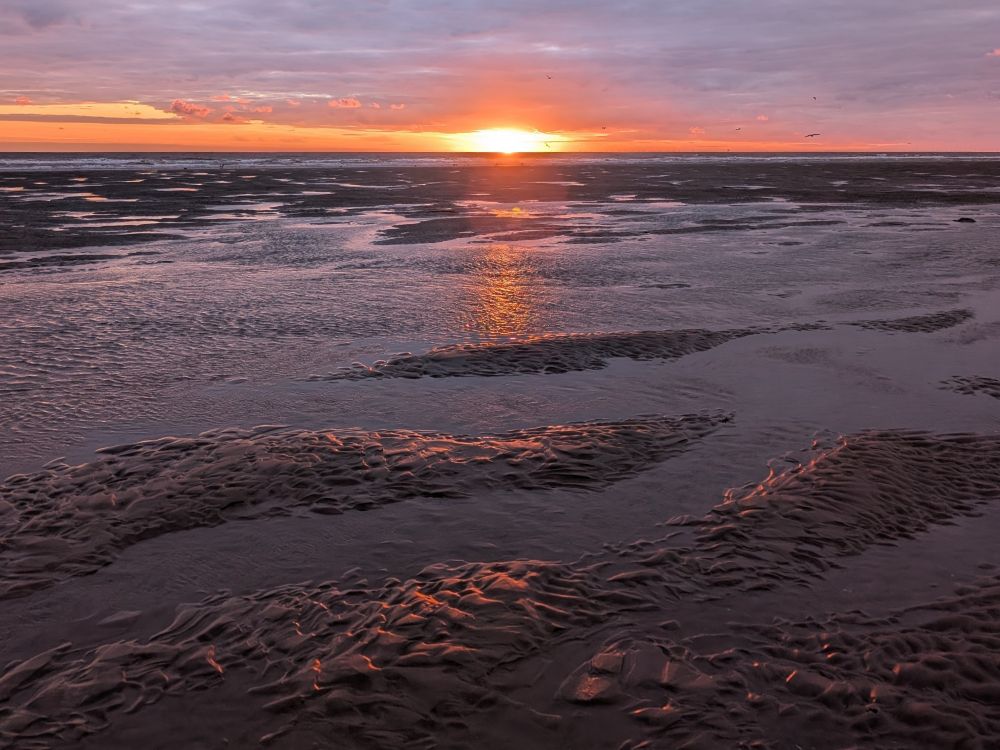 Sunset reflecting on sand