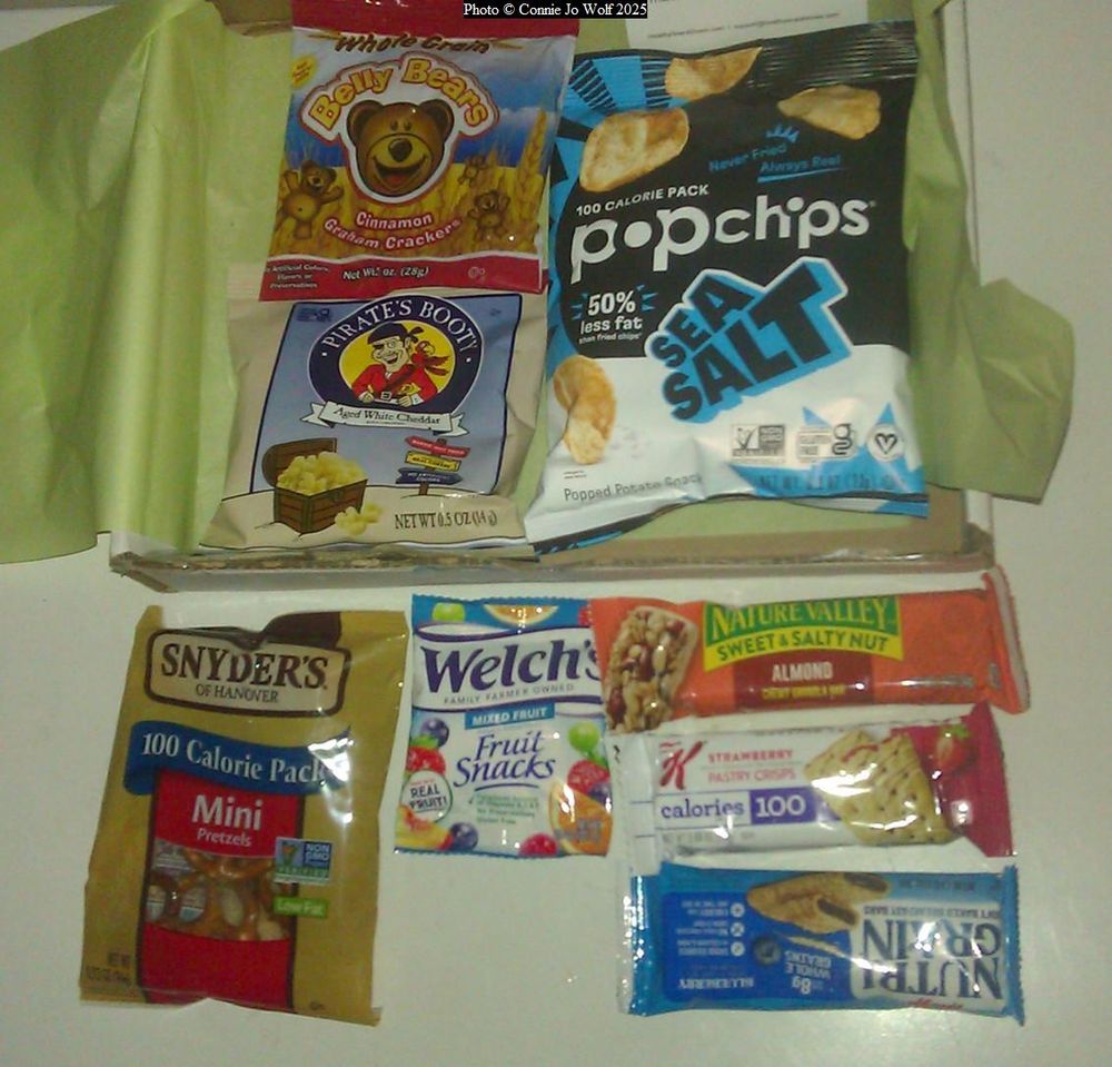 Box with a mix of sweet and savory snacks.