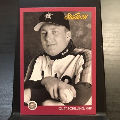 1991 baseball card of a smug Curt Schilling looking like it's his senior yearbook portrait