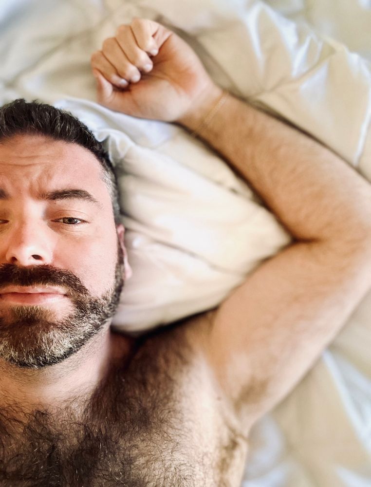 Selfie, led on bed