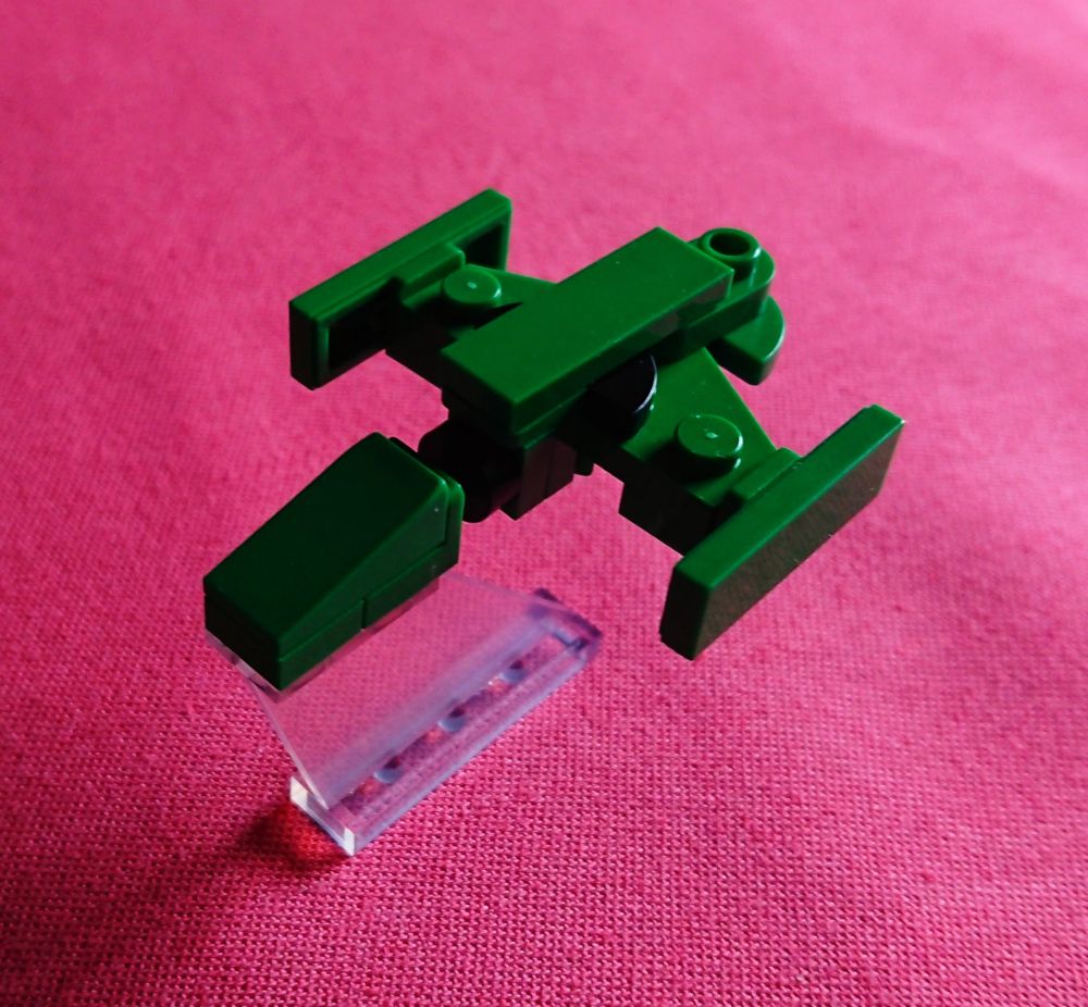 A small model of a romulan starship made out of building bricks. 
