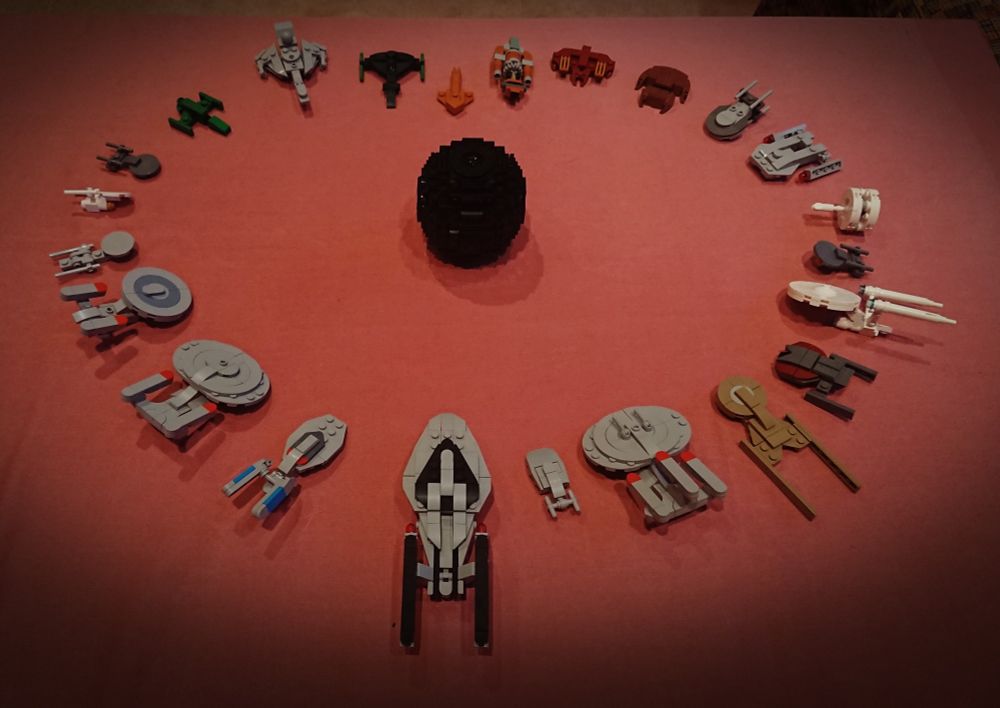 An Armada of 23 different starship models from Star Trek attacking a Borg sphere in the middle.
All made out of building bricks. 