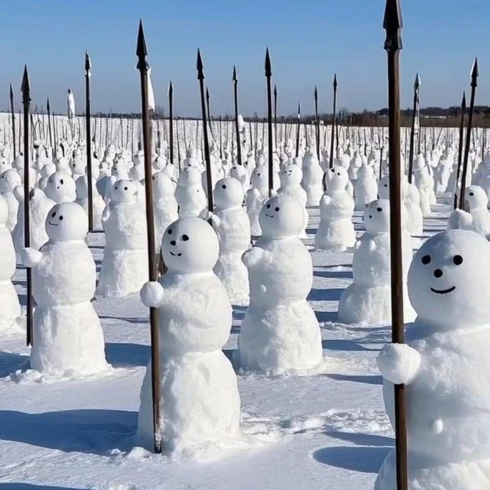 rows of snowmen holding spears in defense on Greenland
