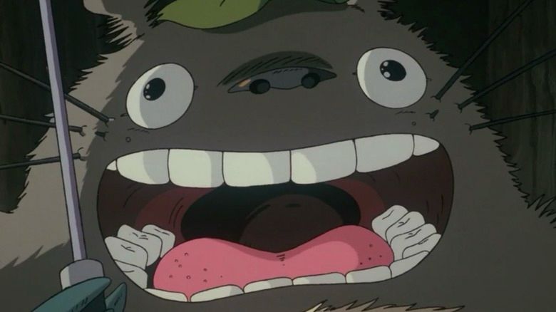 I downloaded this image of Totoro to scare @boob.expert. She was saying that Totoro was scary and actually she kind of has a point.

Pictured: Totoro with his mouth opened extremely wide. His eyes also seem to be drifting slightly.