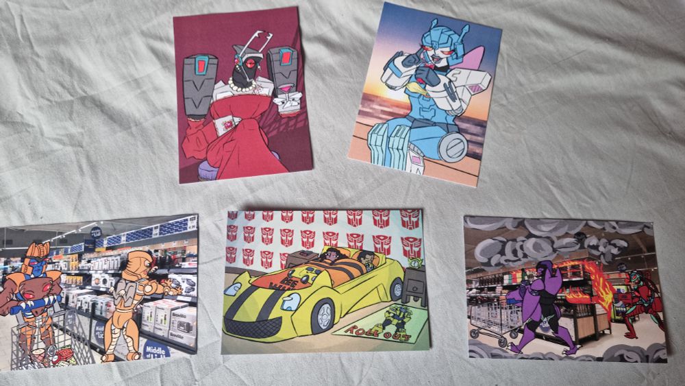 FIVE PRINTS OF BAD ART ON A BED SHEET IT DOESN'T GET WORSE OF A DESCRIPTION THAN THAT