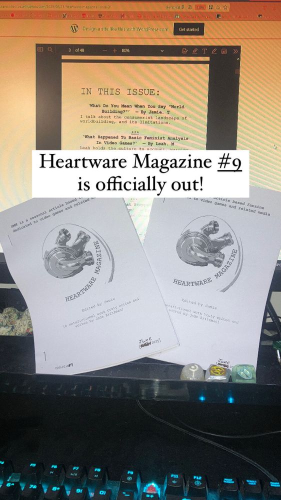 A photo of 2 physical copies of a zine called Heartware Magazine, positioned in front of a computer screen on the digital version of the zine.