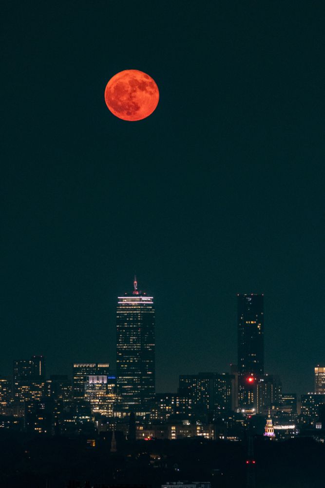 2025 Strawberry full moon rises over Boston