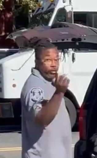 Some ICE worm looking directly at the camera while arresting someone for speech