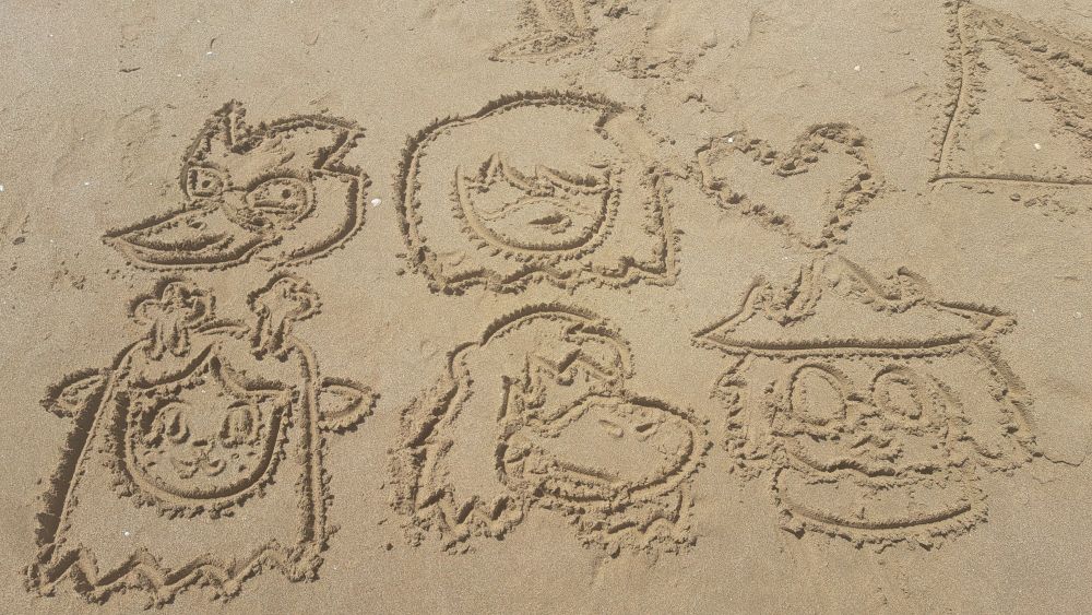 Heads of Kris, Berdly Noelle, Susie, Ralsei and a pixilated heart from Deltarune