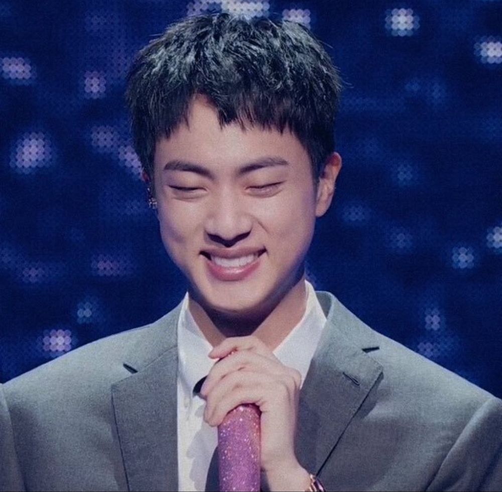 Jin of BTS at the Festa concert he hosted in 2024. His shy smile is the purest and most adorable 