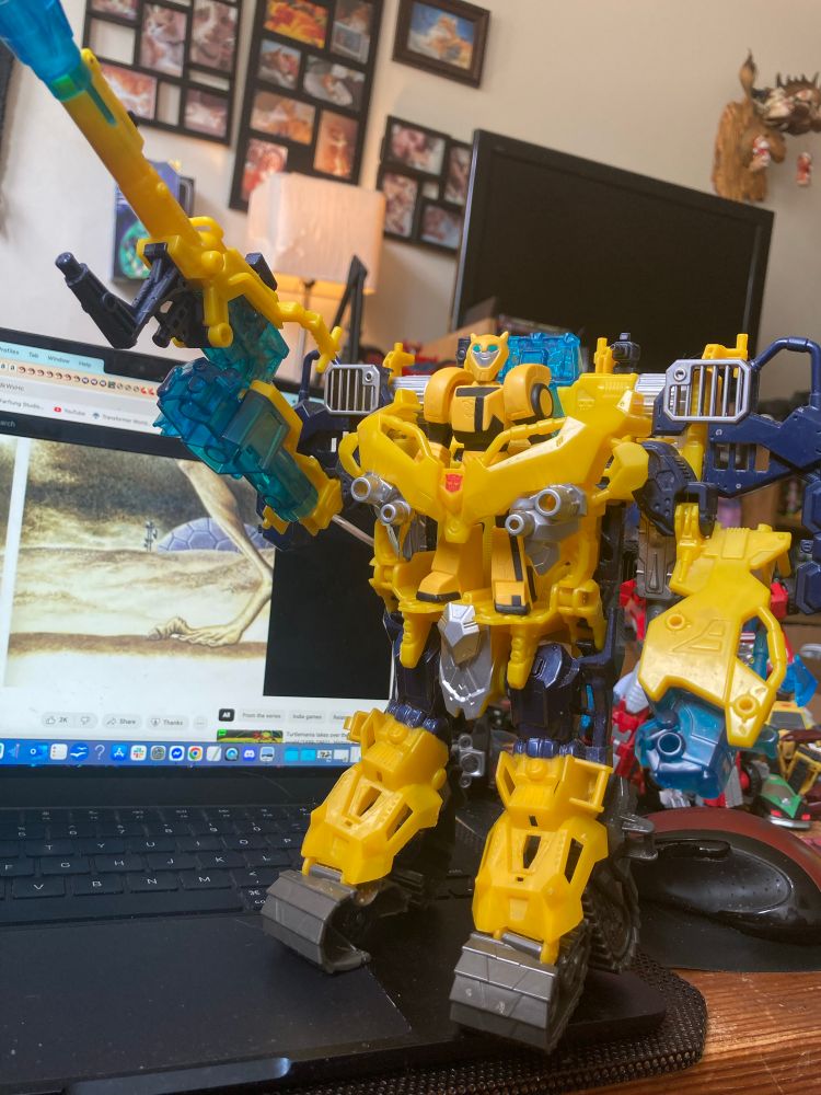 A Japanese Transformers Animated Bumblebee (originating from Derrick J Wyatt’s personal collection) piloting the Prime Cyberverse Bumblebee tank/mech
