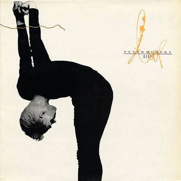 The cover of Peter Murphy's Deep, a white background with Murphy in all black (shocking) bent over at the waist with his arms stretched up behind his back 