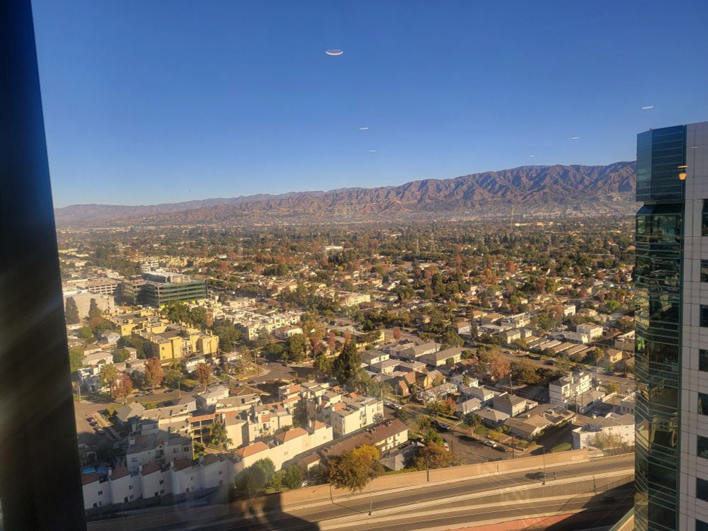 Aerial view of Burbank from 24th floor, mountains in background