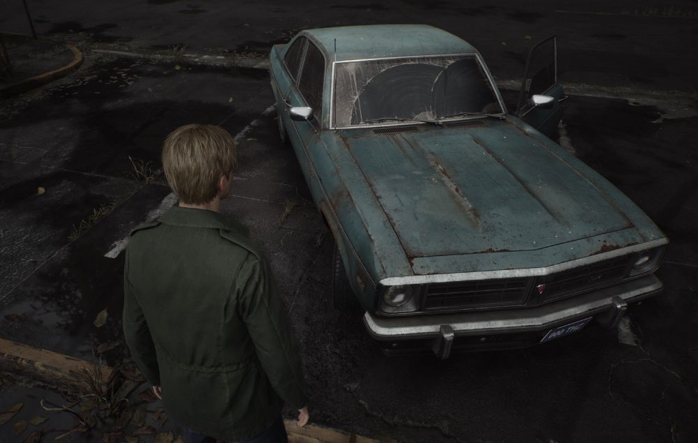 shitty sedan diagonally parked across 3 spots like an asshole