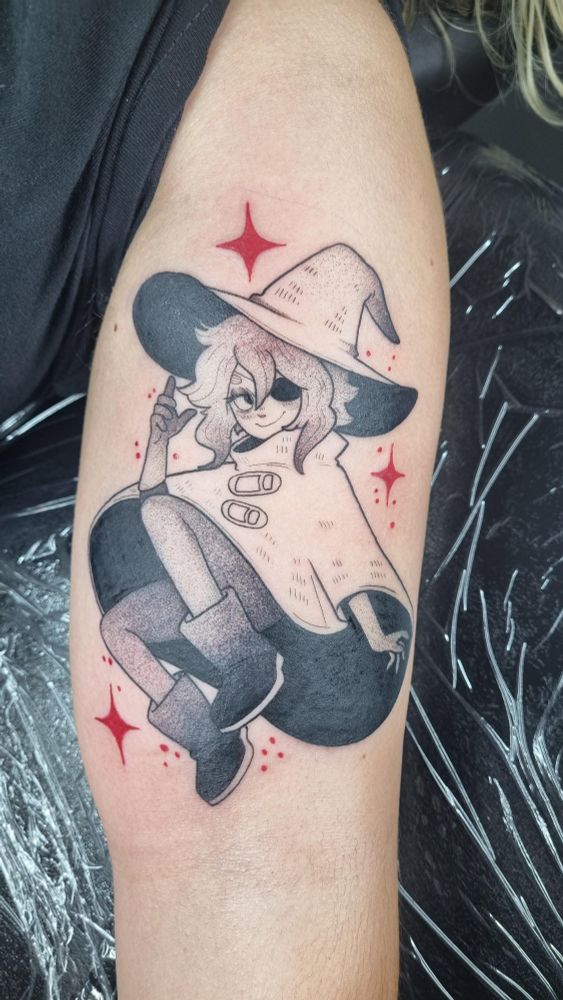 On user Nyufeine's left biceps is tattooed Siffrin from In Stars and Time, surrounded by Red stars