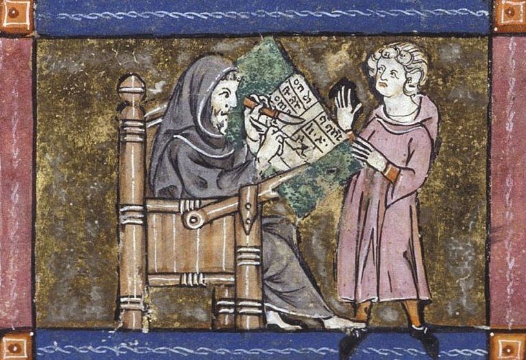 Merlin dictates his adventures to Blaise. An illustration from a medieval manuscript.