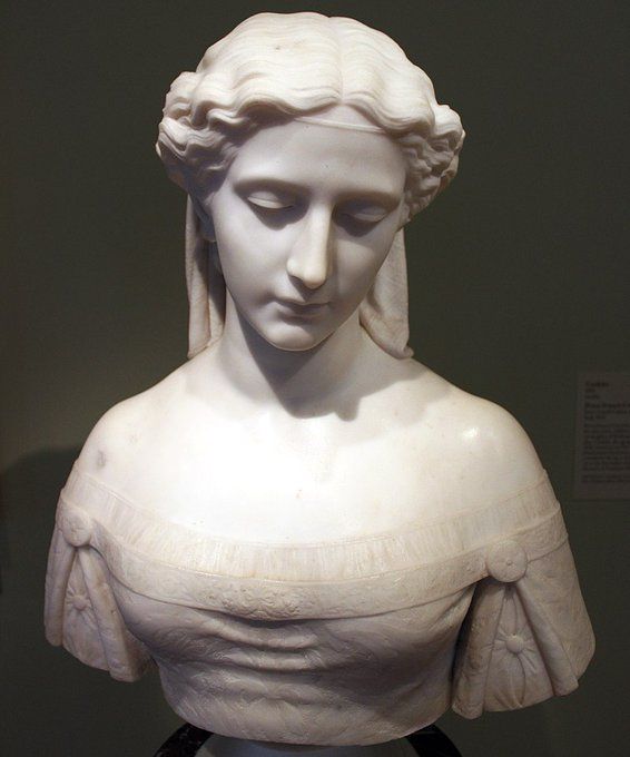 Bust of a sad Queen Cordelia. It is carved by Pierce Francis Connelly.