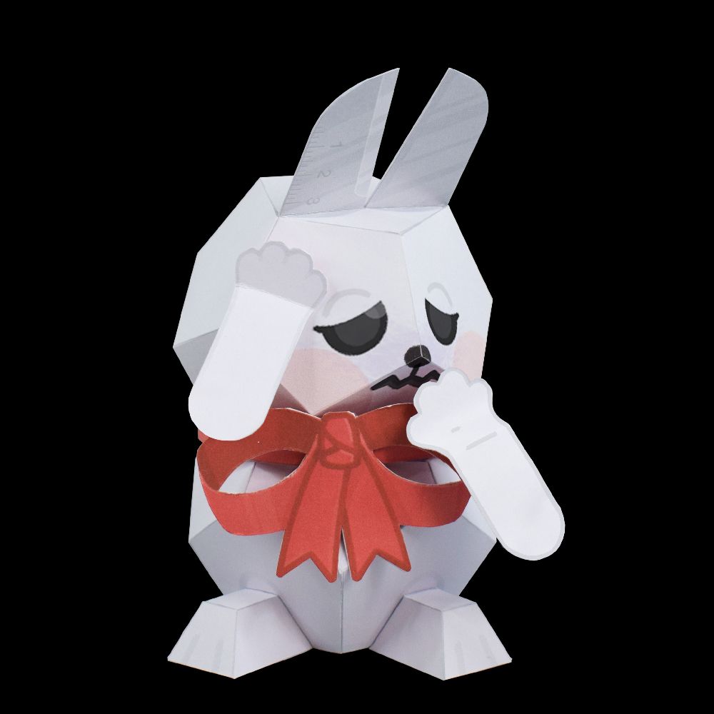 A papercraft rabbit looking sad