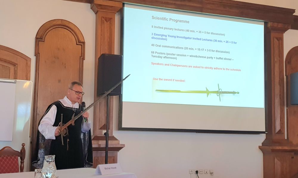 Michal Hocek telling us a (very big) sword will be used if we go over time on our talks...