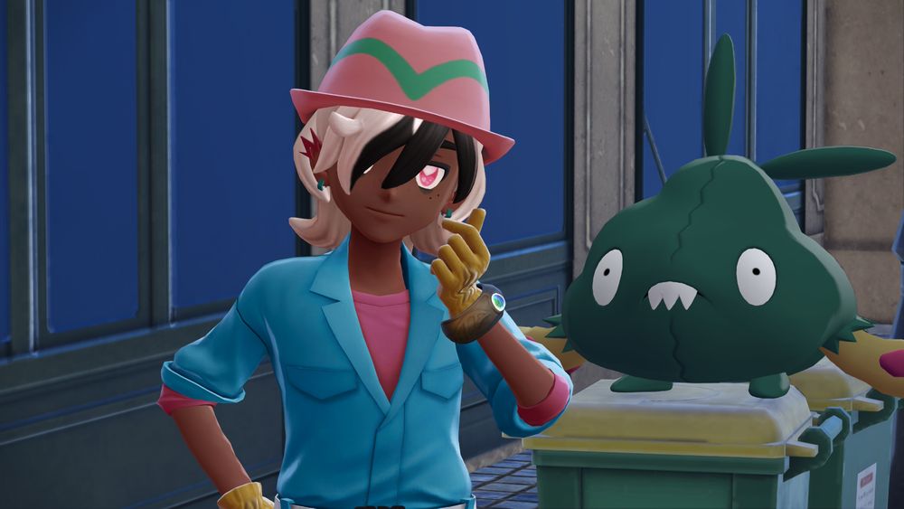 A pokemon protag with hauntingly pink heart filled eyes poses by a cute garbage boy.