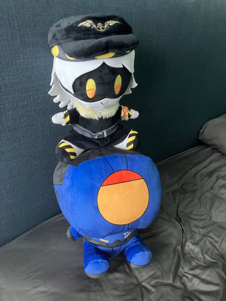N murder drones plush sitting on top of V1 Ultraplush