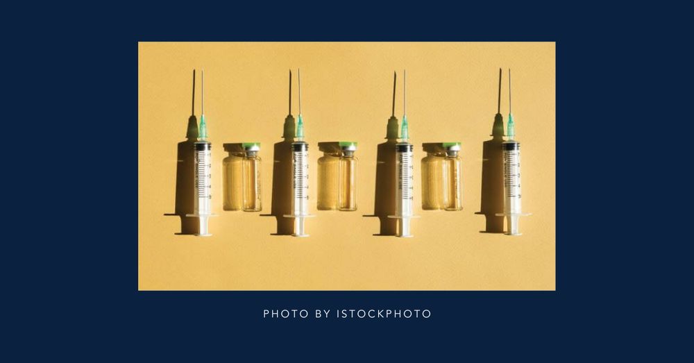 Four needles laid out with liquid steroids in small bottles in between the needles.