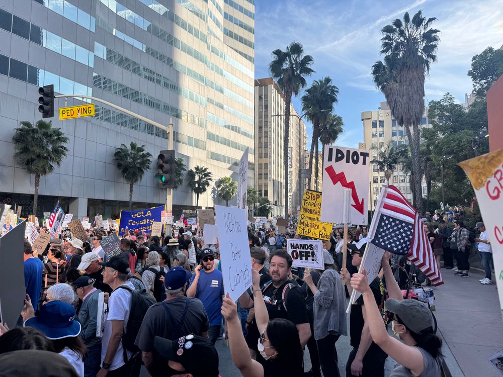 People marching holding signs