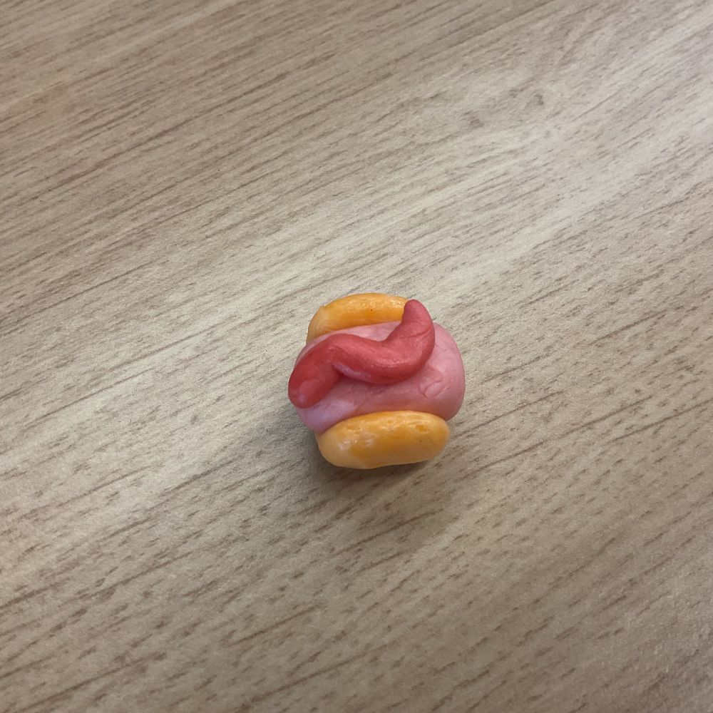 A hotdog made of Starburst. Compared to the previous make, the colors are oriented correctly.