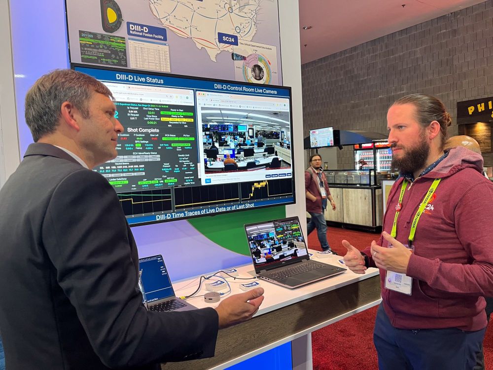 Researchers discussing a demo