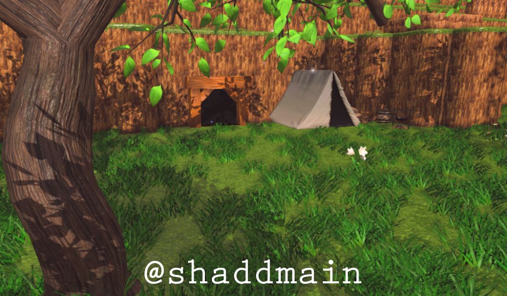 A close-up of a new area added in the redesign with a cave entrance and camp. There will eventually be a cave to explore and a side quest for an objective in the cave given to the player by an NPC at the Camp.