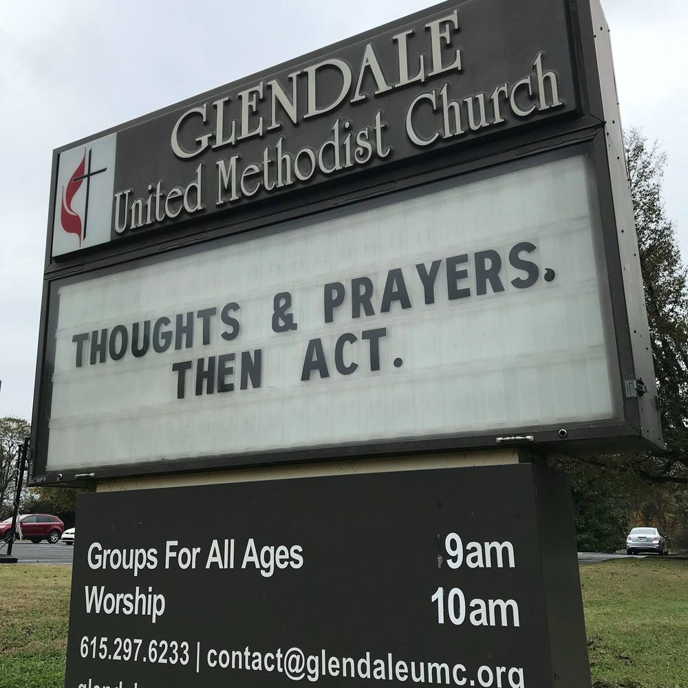 Outdoor church sign at Glendale United Methodist Church in Nashville Tennessee that says: thoughts and prayers, then act.