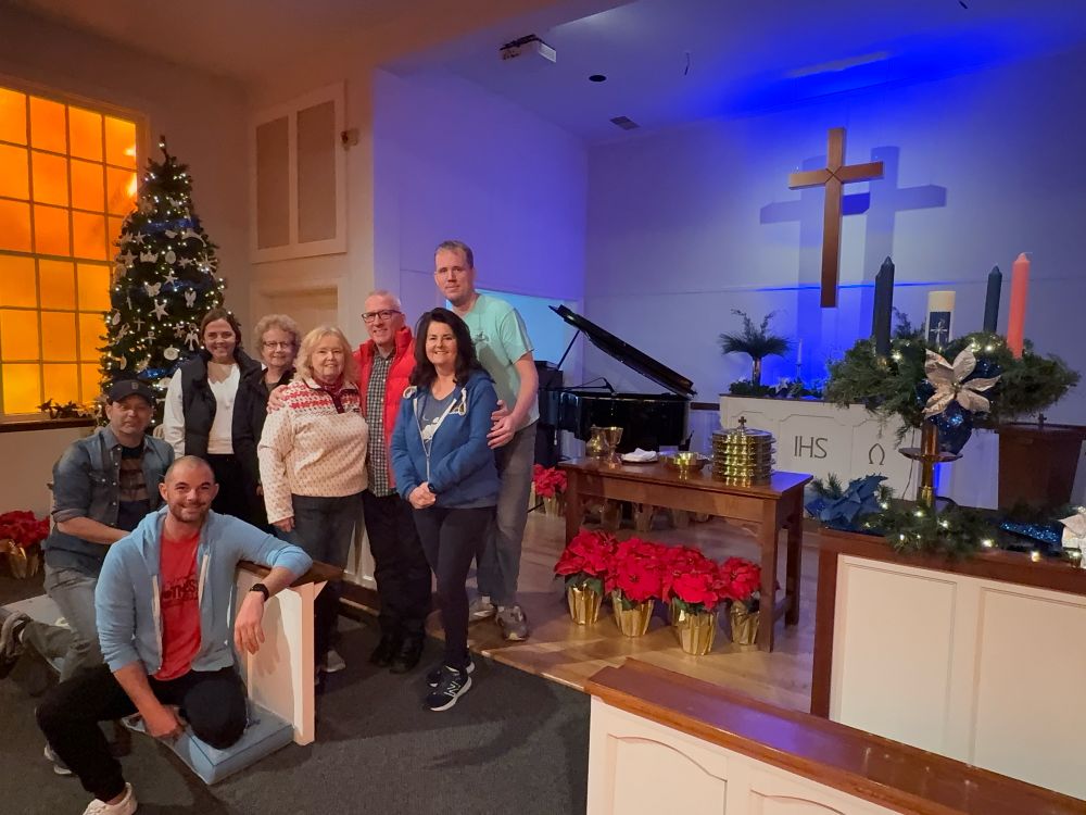 Photo of people from Glendale United Methodist Church after decorating the sanctuary for the advent and Christmas season. 