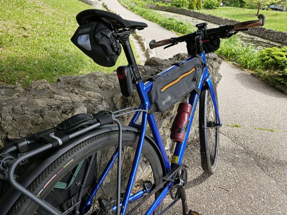 Bicycle leaning on a stone wall