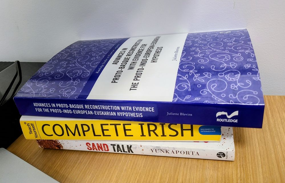 Three books on my desk, completely unrelated to my line of work

from bottom to top:
(1) Sand Talk by Tyson Yunkaporta
(2) Teach Yourself Complete Irish
(3) Advances in Proto-Basque Reconstruction with Evidence for the Proto-Indo-European-Euskarian Hypothesis by Juliette Blevins