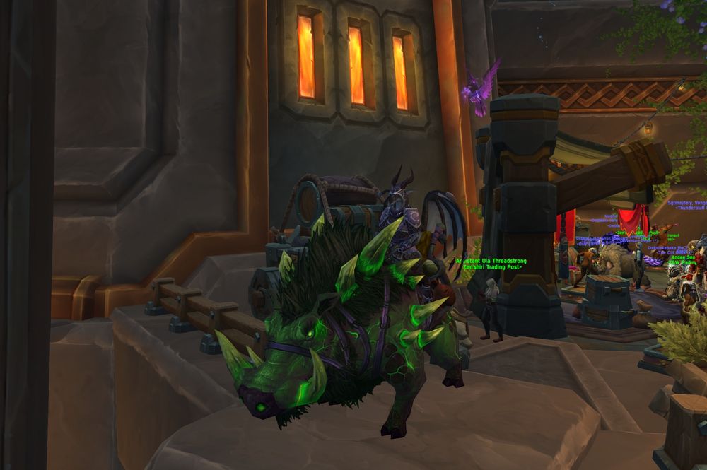 a mage in world of warcraft on a boar mount