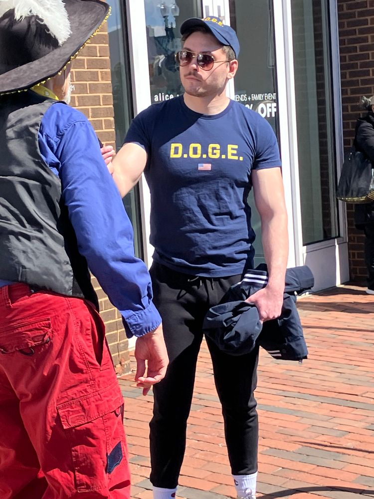 One of several Nazi trolls “interviewing” one of the protestors