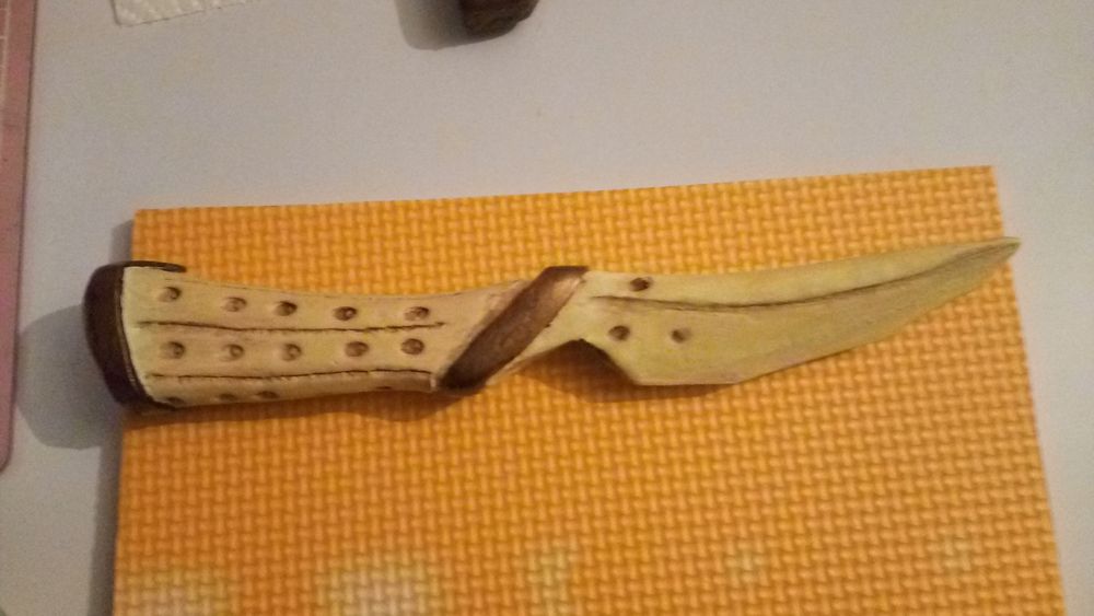 Dune (David Lynch 1984) Crysknife homemade replica sat on part of the foam mat it was made from