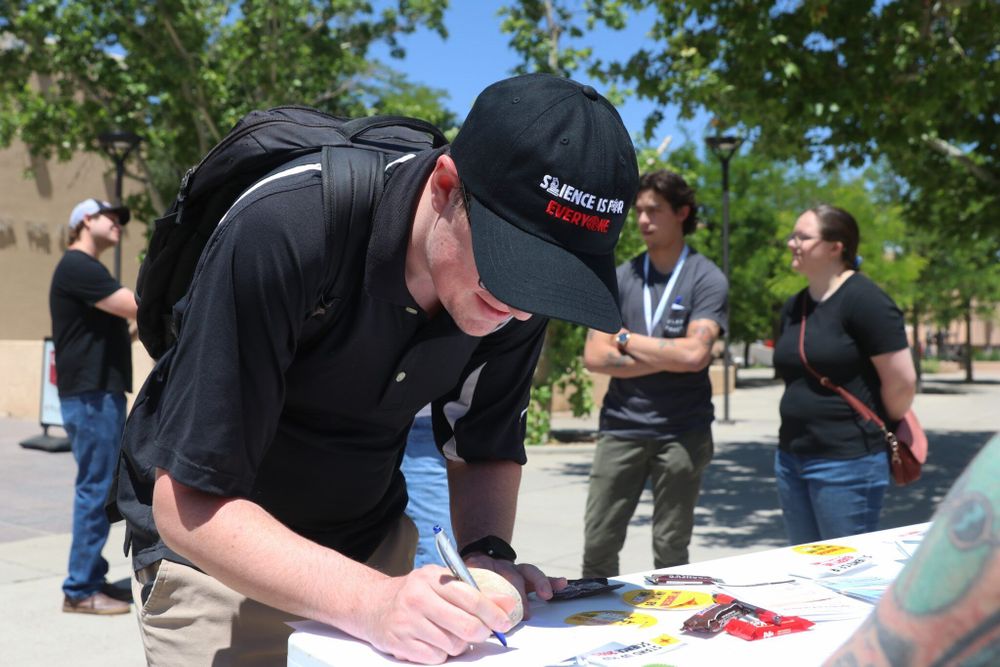 UNM post-docs forewarn threats to research at Stand Up for Science event • Source New Mexico