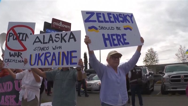 Protesters waving Ukrainian flags lined the streets of Anchorage, Alaska on Thursday ahead of a planned Trump-Putin summit at an American military base outside the Alaskan capital, demanding that Trum...