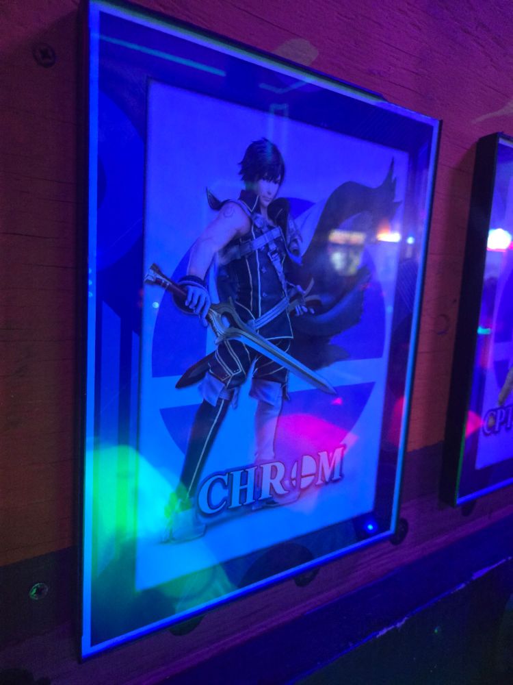 Chrom from Smash on a plaque, indicating a character selection for laser tag.