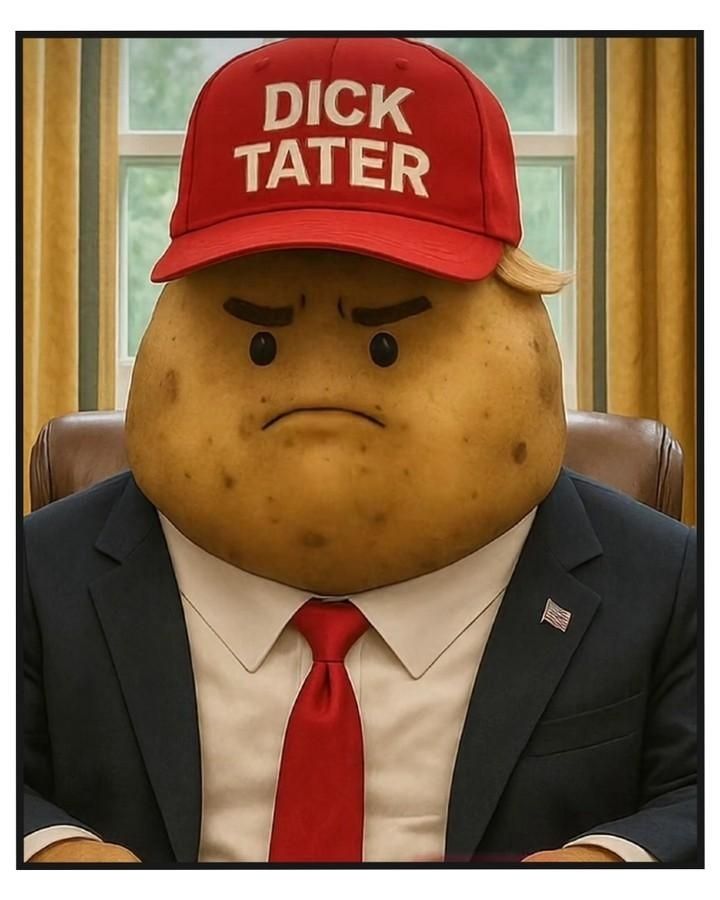 Potato in business suit with a red hat. Hat says 