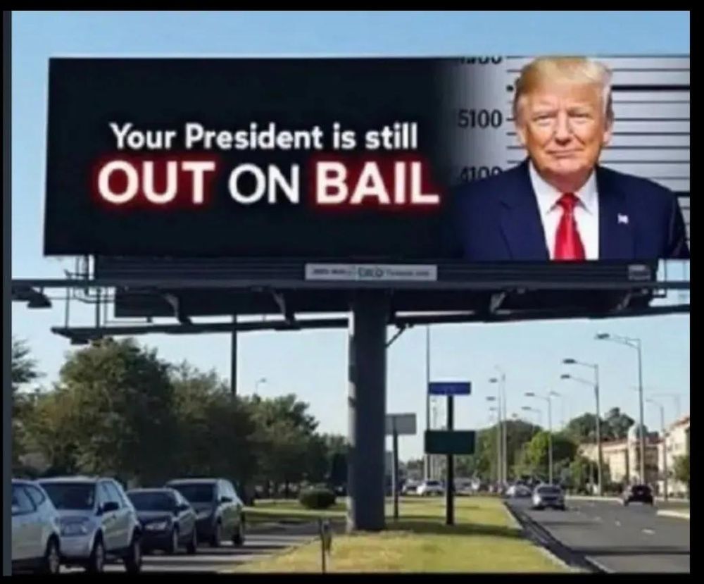 Billboard that says: Your president is still out on bail
