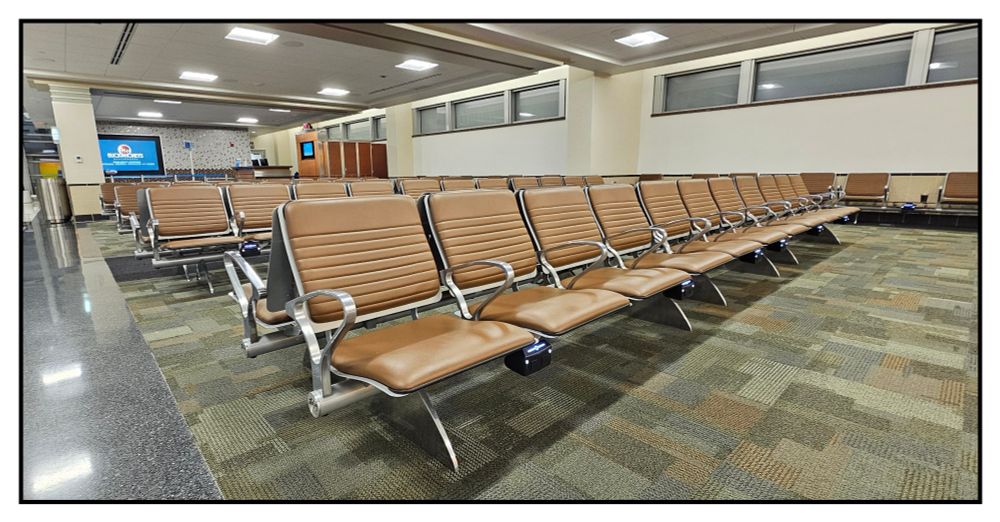 Instead of letting us fly, American Ahole Airlines invited us to spend 9 hours in the Dane County Airport in Madison, Wisconsin. Eventually most of it was empty.