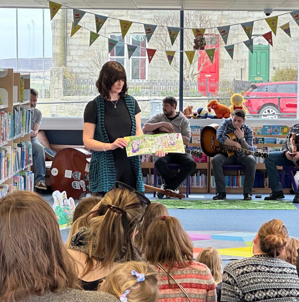 Author Ann Marie Anderson reading from her new book.